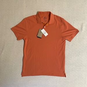 New with tags. The Nike Polo. Medium. Dri-Fit. Orange.